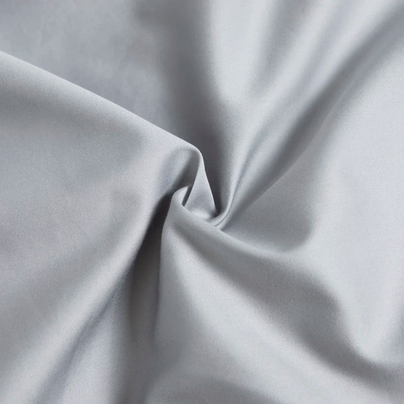 Variantes de couleur des draps : gris, bleu et blanc