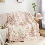 couverture matelassée fleurs patchwork rose violet géométrique frangée chambre coucher saisonnée