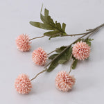 décoration intérieure moderne bouquet artificiel rose blanc violet boules fleurs feuilles vertes mariage anniversaire