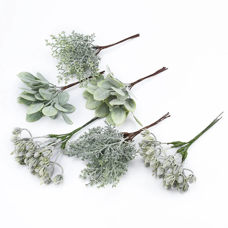 bouquets artificiels naturels decoration mariage exterieur feuilles vertes fleurs blanches rustiques fixations fil fer