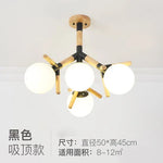lampe suspendue moderne blanc bois sphères opaques scandinave chaines métallique
