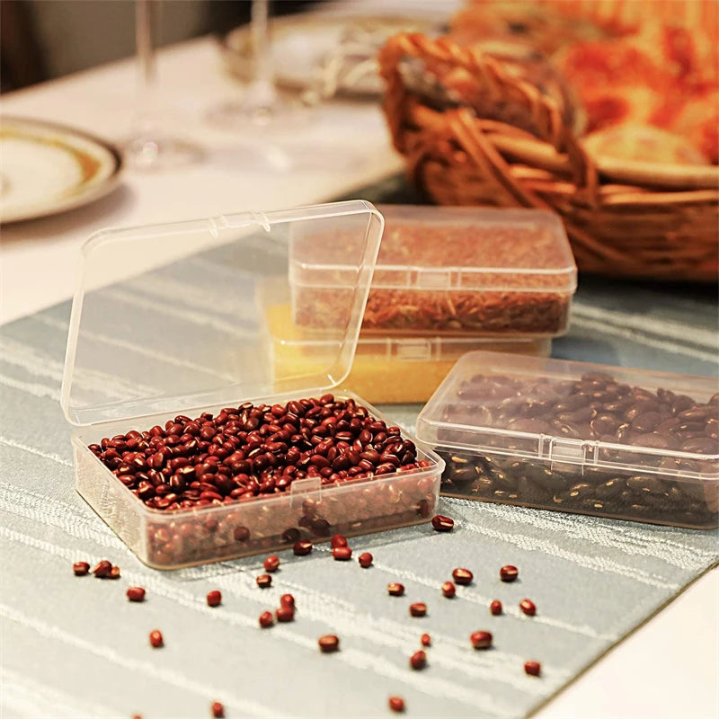 Mini boîte de rangement transparente avec couvercle utilisée pour ranger des bijoux