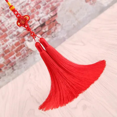 pompon soie couleur doré rose vert foncé uni opaque traditionnel fixé chainette breloque