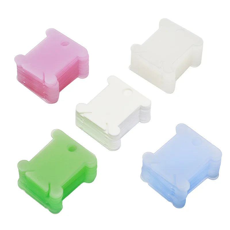 bobines fil transparentes modernes couleur rose blanc vert bleu rangement fil coudre