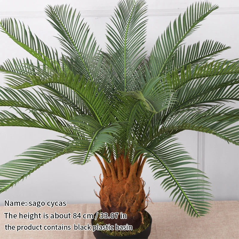 plante artificielle moderne feuilles vertes tronc texturé pot noir décoration intérieure feuilles fines branche
