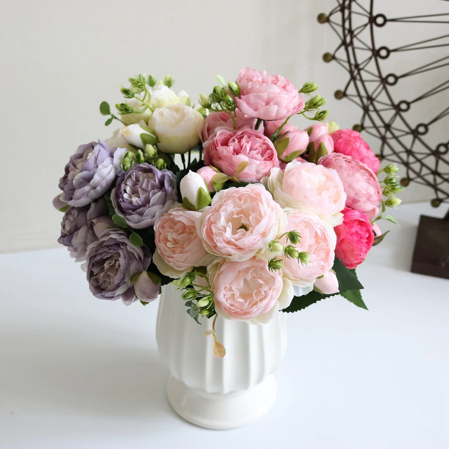 bouquets fleurs artificielles rose blanc lilas vert vases transparents blancsextérieur mariage décoration chambre salon