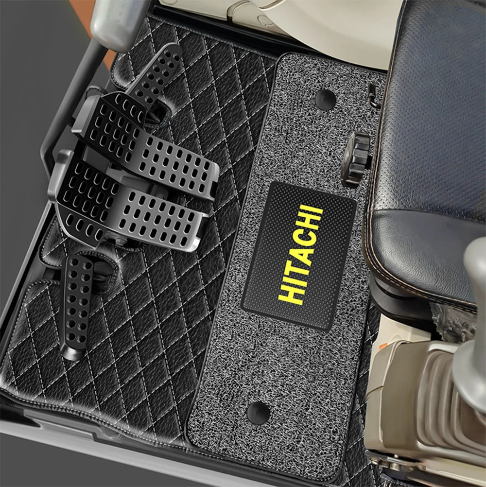 tapis sol rouge noir quilté moderne hitachi logo cabine véhicule