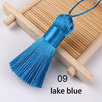pompons soie polyester 5cm longueur 18cm corde noir rose rouge vert jaune bleu modernes
