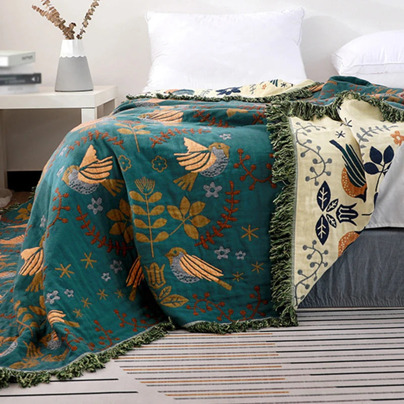 couverture coton brodée oiseaux fleurs ethnique vert foncé beige orange bleu franges multicolores