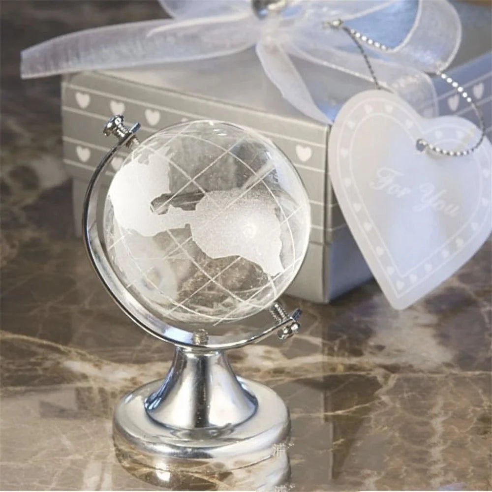 globe terrestre cristal transparent relief continents support métallique or argenté décoration élégante enseignement enfants
