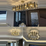 Suspension lumineuse contemporaine transparente dorée cristaux géométriques chambre salon