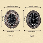 horloge murale art déco plumes paon strass solaire résine noir argenté unique