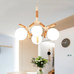 lampe suspendue moderne blanc bois sphères opaques scandinave chaines métallique