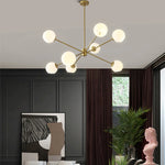 suspension lumineuse moderne or noir sphères transparentes scandinave