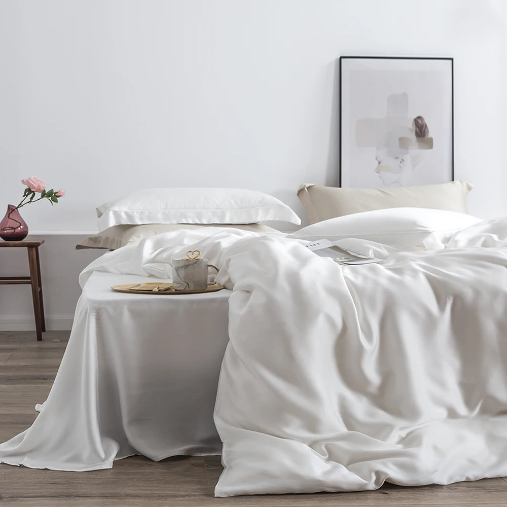 ensemble literie soie rose poudré drap housse taies oreillers minimaliste moderne élégant doux respirant