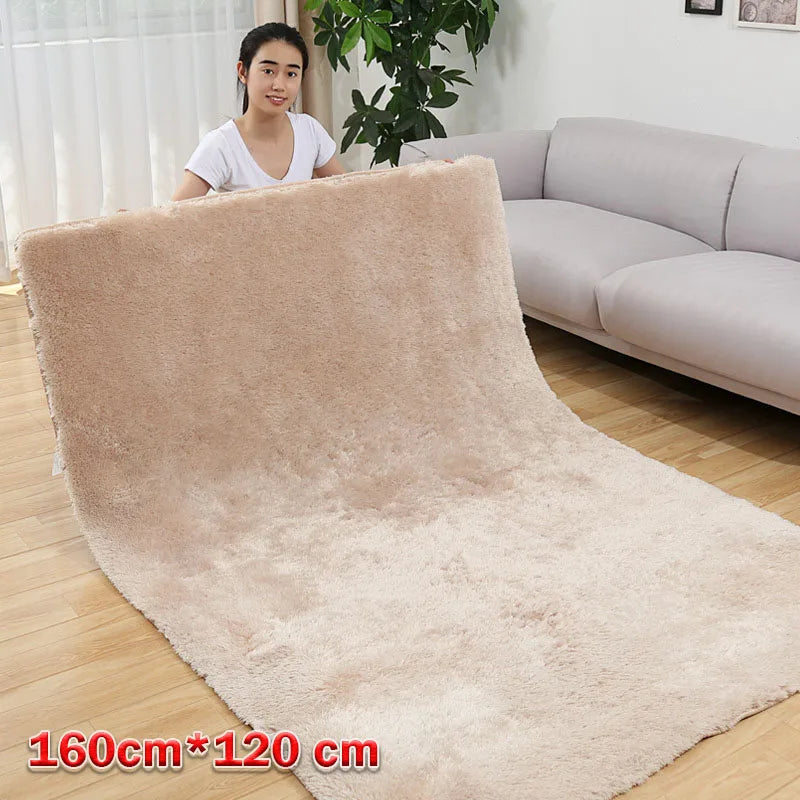 tapis moderne doux uni beige clair rose pâle bleu clair bordure fleurs noires 160cm