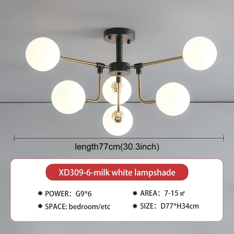lampe suspension moderne sphères translucides structure dorée salon blanc nordique