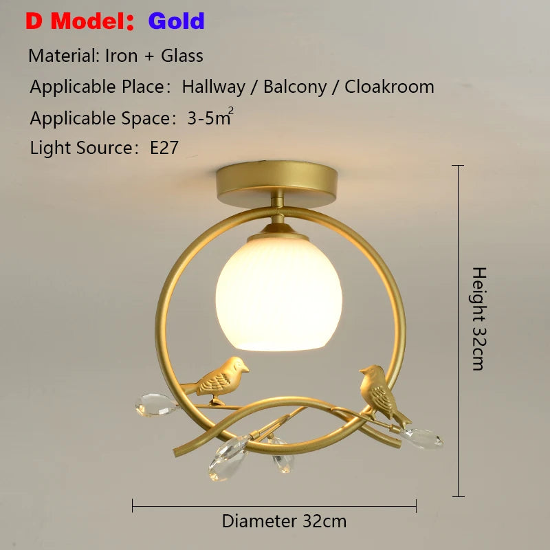 lampe moderne or noir oiseaux dorés branches sphère blanche translucide led echangement facile