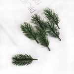 décoration noël couronne branches pin feuilles baies bougies naturel extérieur festive arrangement