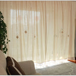 rideaux bohèmes broderies fleurs lin translucides salon boutique crème