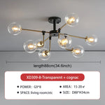 lampe suspension moderne sphères translucides structure dorée salon blanc nordique