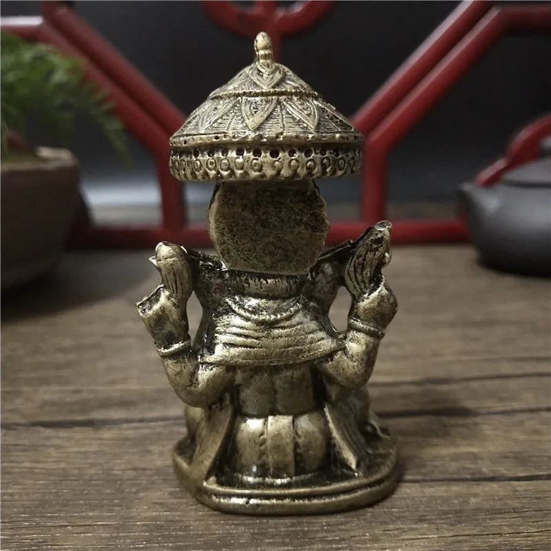 statue ganesha dorée résine ornements complexes décoration intérieure artisanale traditionnelle bouddhiste éléphant multiple bras