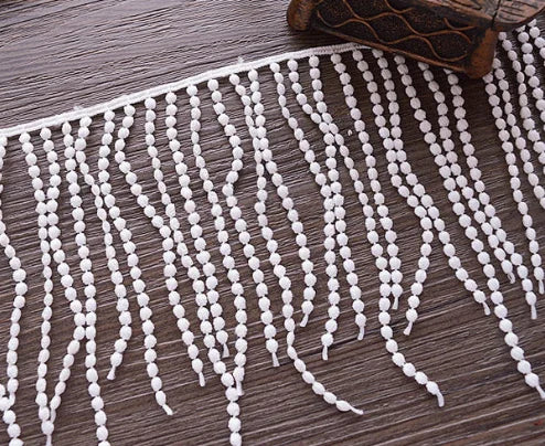 ruban pompons blancs coton décoratif largeur 11.4cm effet bohème solubre franges semi transparent
