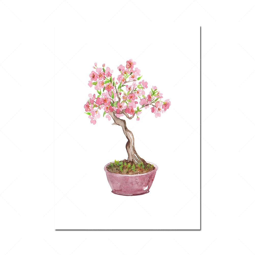 Un arbre en fleurs rose épanoui dans un pot rose.