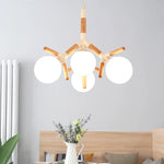 lampe suspendue moderne blanc bois sphères opaques scandinave chaines métallique