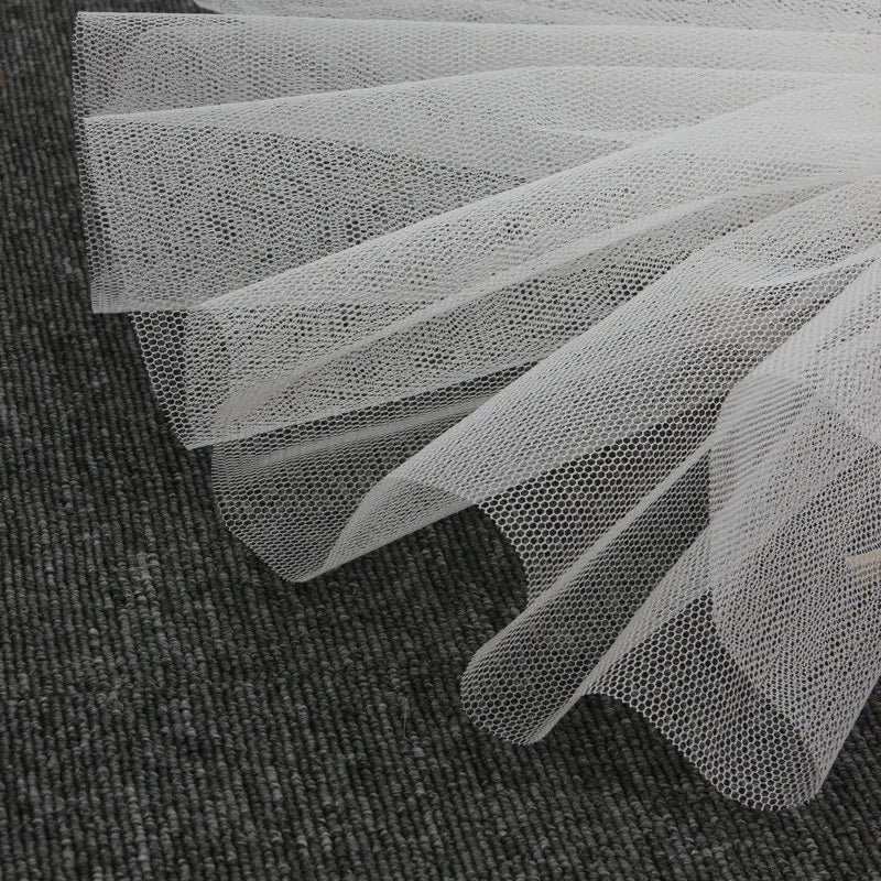 jupe blanche tulle maille hexagonale extra rigide classique tissu polyester acrylique large 180cm blanc