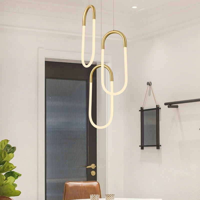 suspension lumineuse moderne or blanc pince papier finition lisse minimaliste salon chambrehôtel