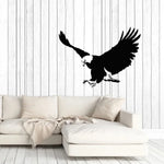 Sticker mural aigle tribal bleu appliqué sur une fenêtre avec vue sur l'intérieur