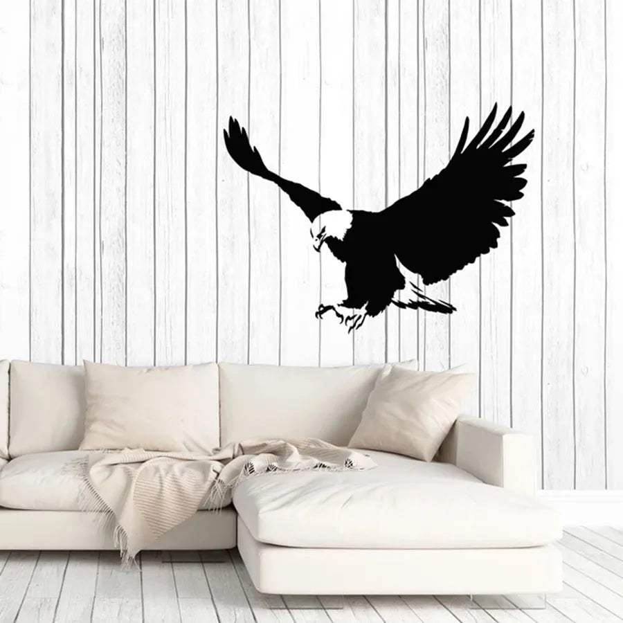 Sticker mural aigle tribal bleu appliqué sur une fenêtre avec vue sur l'intérieur
