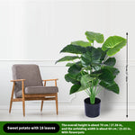 décoration extérieure plante artificielle verte moderne grande feuilles pot noir exposition sol festive