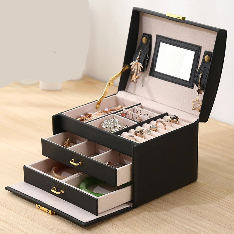 boîte bijoux rose pâle blanc noir miroir compartiments bracelets boucles oreilles bagues montres portable