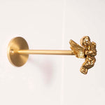 pince rideau dorée insectes anges détails sculptés quincaillerie fenêtre vintage opaques
