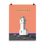 Le phare emblématique d'Akranes, en Islande, s'élève majestueusement sur un paysage rocheux, offrant une image représentative de la beauté unique de cette destination.