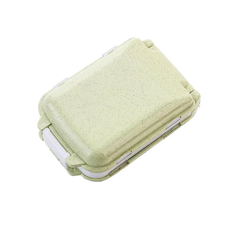 organisateur médicaments boîte pilules compartiments clips couleurs vert rose pratique compact