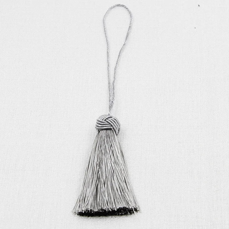 pompons franges decoration maison beige gris blanc bleu marine noir tissu élégant