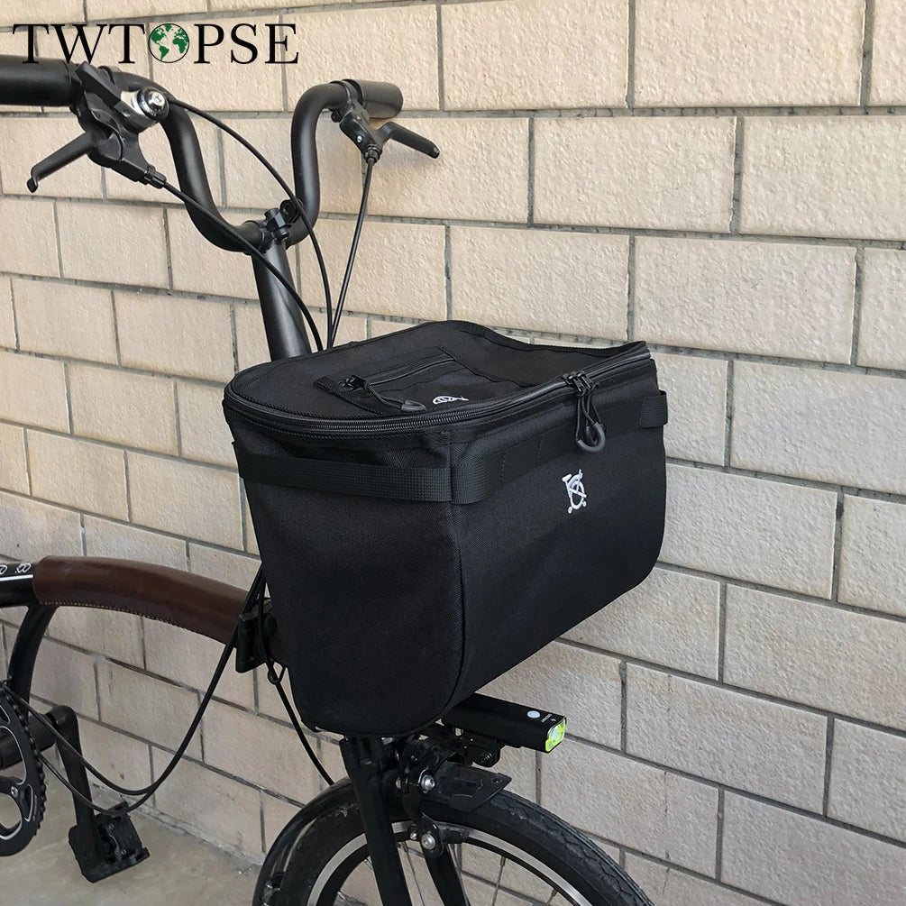 sacoche vélo étanche noir tissu mat minimaliste fixations métal pannier brompton dahon