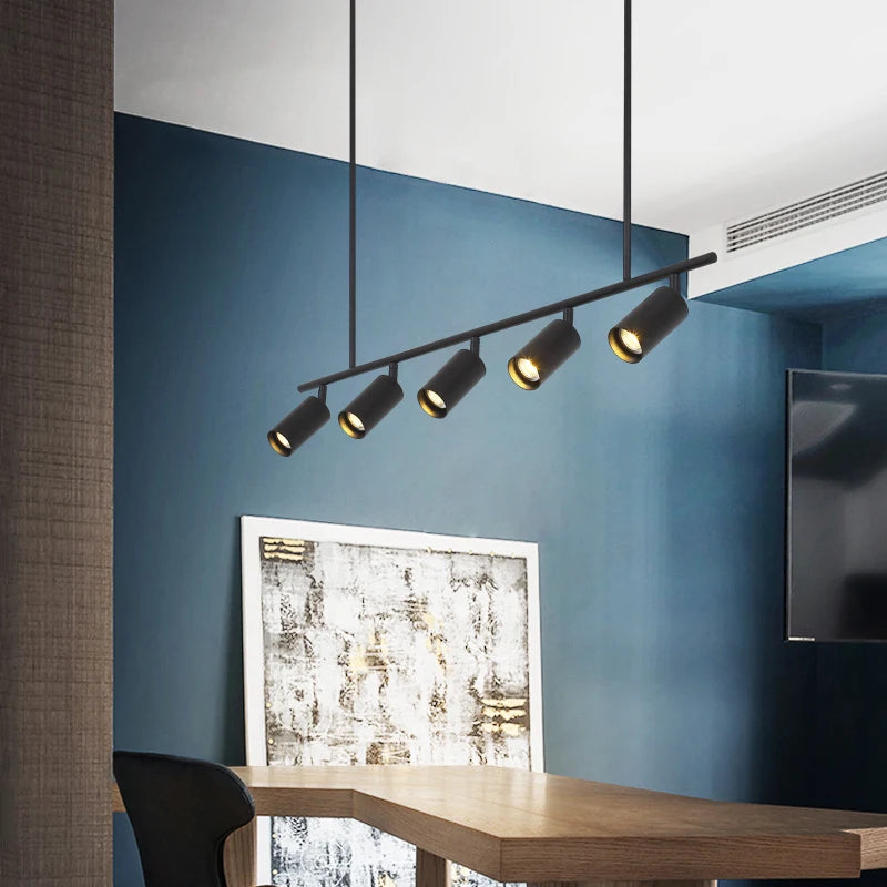 suspension lumineuse moderne noir doré tête brillante métal poli minimaliste