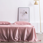ensemble literie soie rose poudré drap housse taies oreillers minimaliste moderne élégant doux respirant