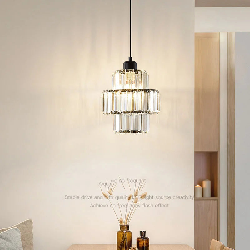 Suspension lumineuse transparente moderne rangs verre dorés élégante chambre salon