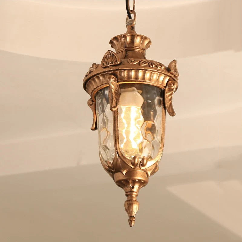 Lampe suspendue or noir verre translucide classique baroque chaîne texture métallique motif sculpté