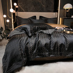 Détail du motif Jacquard et du fil d'or noir sur la housse de couette