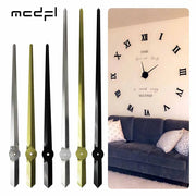 horloge murale aiguilles géantes métal moderne noir argenté doré