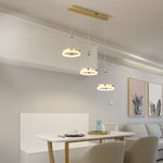 suspension lumineuse moderne dorée anneaux blancs câbles suspendus chambre salon étudié