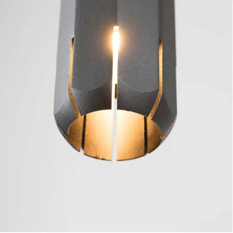 lampe suspendue or rose moderne facettes géométriques câble noir chambre salon