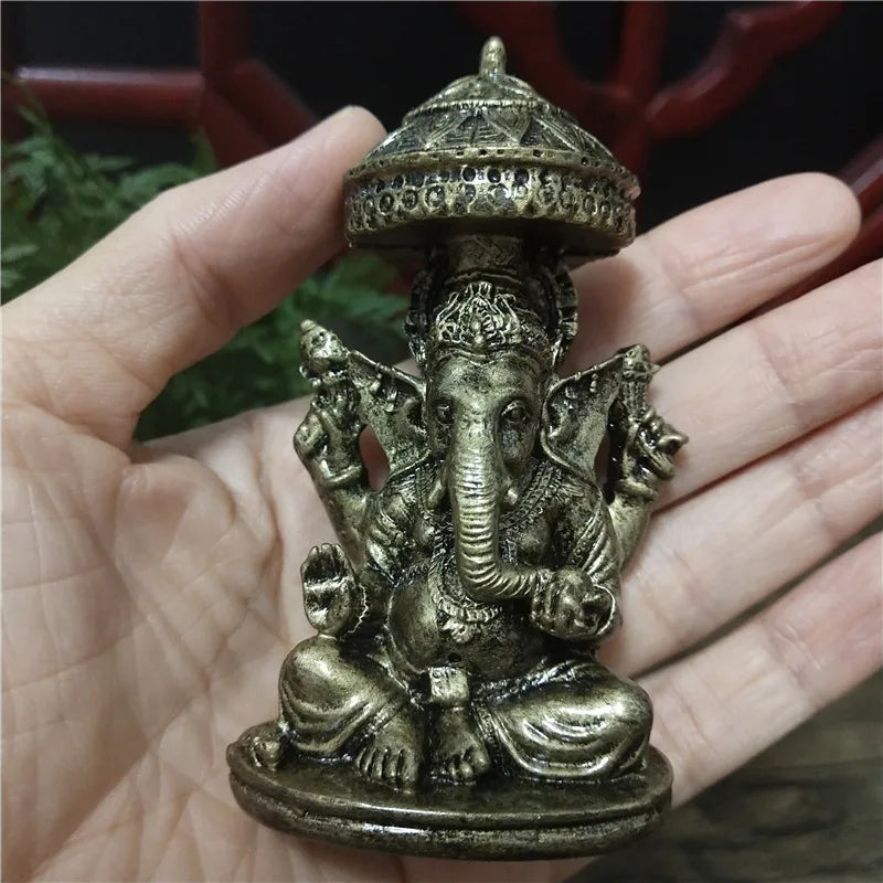 statue ganesha dorée résine ornements complexes décoration intérieure artisanale traditionnelle bouddhiste éléphant multiple bras