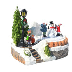 Maison miniature lumineuse de Noël rouge avec éclairage